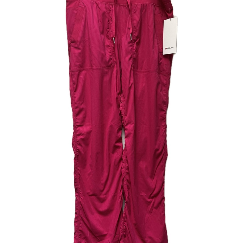Lululemon Athletica dance studio, mid rise, regular in Sonic Pink. Rare color